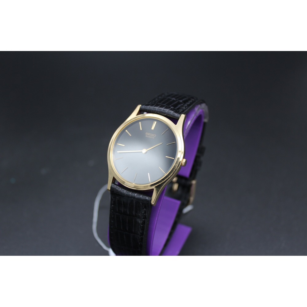 Vintage Seiko‎ 7N00-7008 Gold Tone Quartz Dress Watch Gray Dial